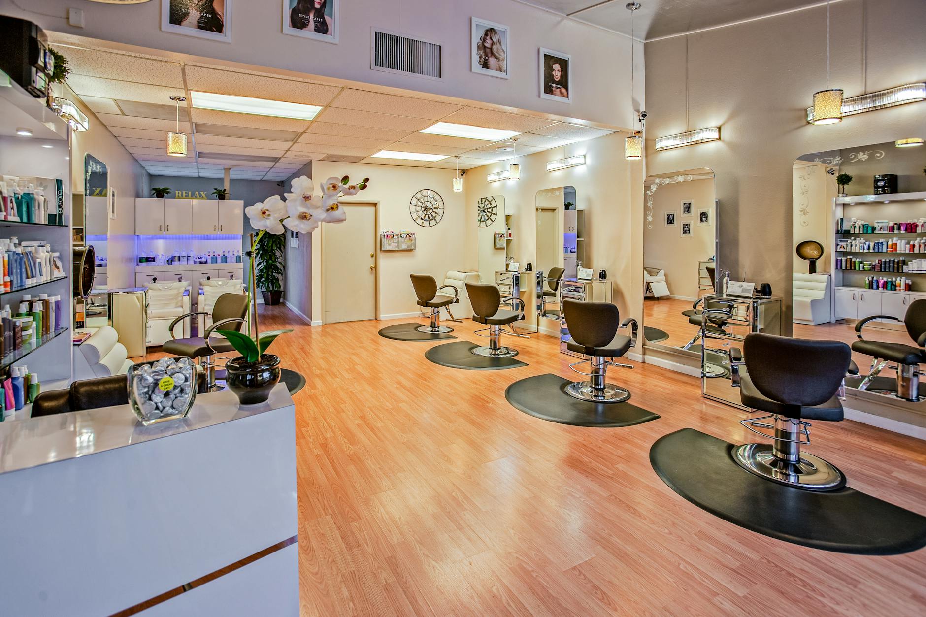 Modern clean beauty salon interior with tanning booth